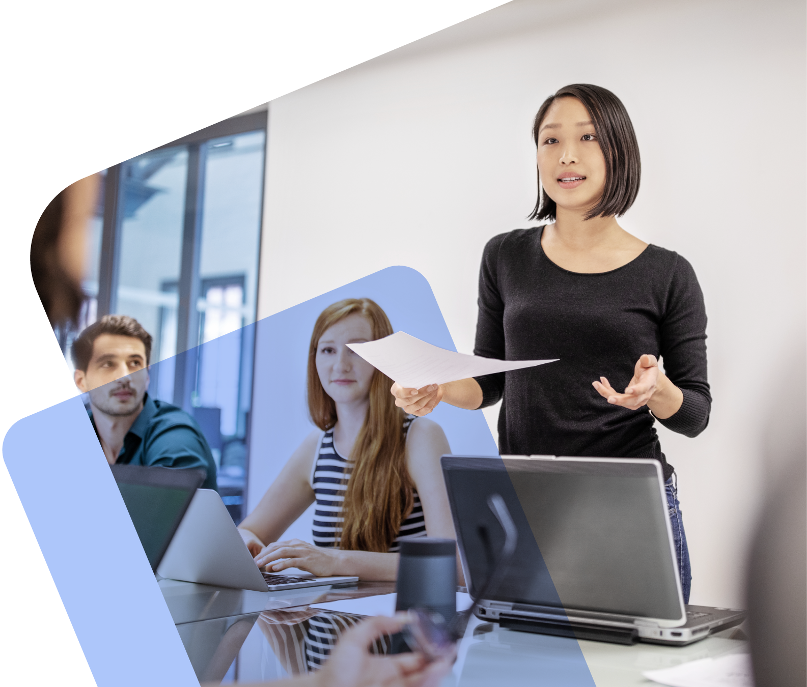 Woman presenting in a conference room